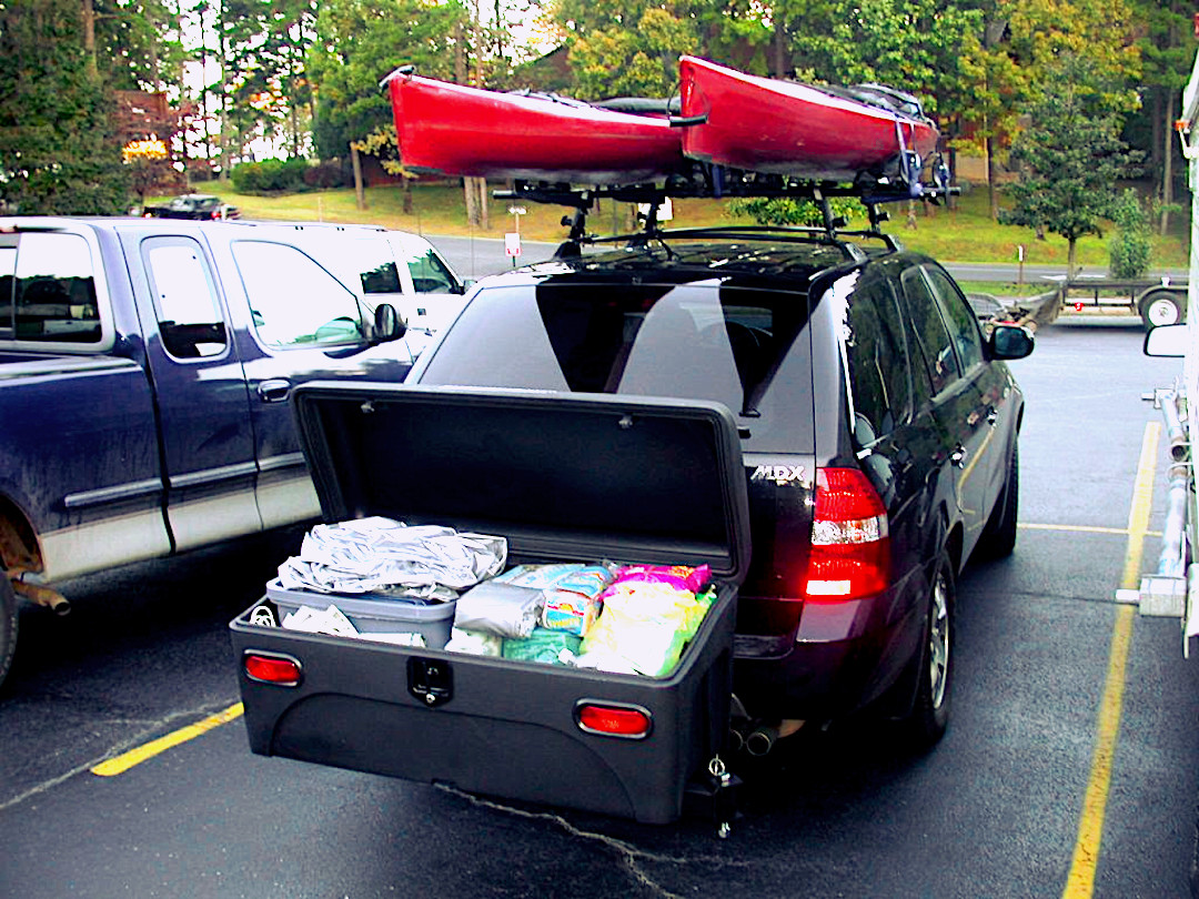 Acura MDX SUV with a StowAway Standard Cargo Box with lid open