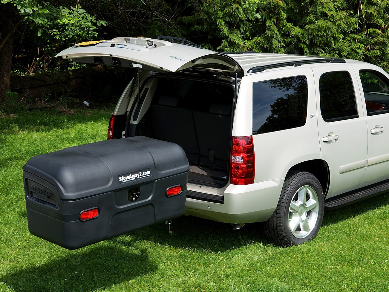 StowAway Max Box on Chevy Tahoe parked on grass.