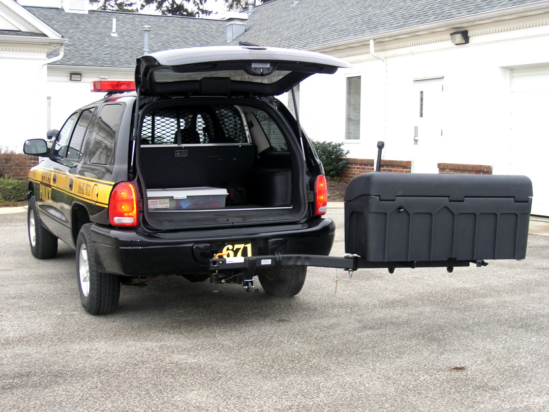 StowAway Standard Hitch Mount Cargo Carrier on Dodge Police Vehicle in Swung-Out Position