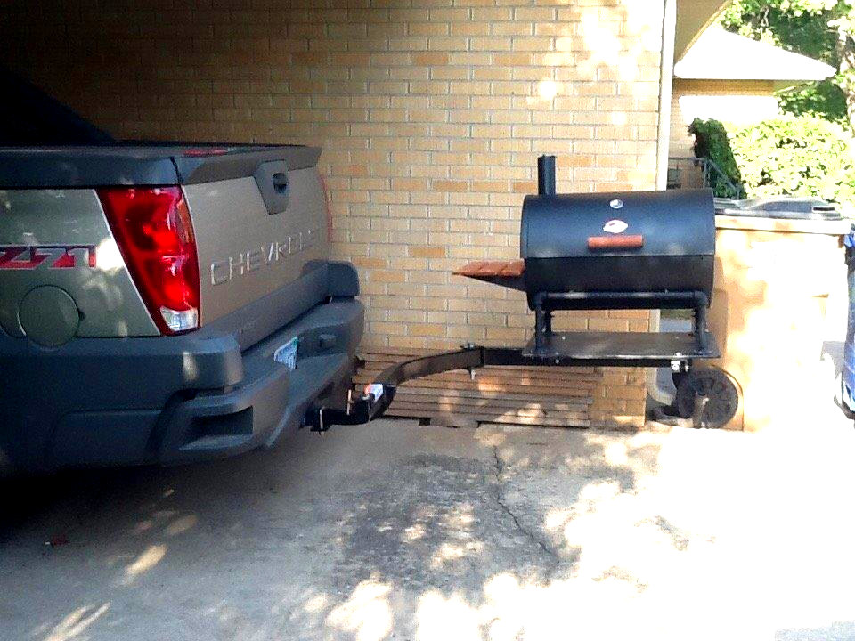 A grill and StowAway Swingaway frame on Chevy Truck.